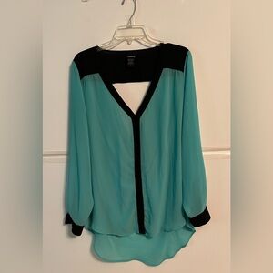 Torrid Woman’s LS Teal and Black V-Neck Blouse. Has a draped, open back.